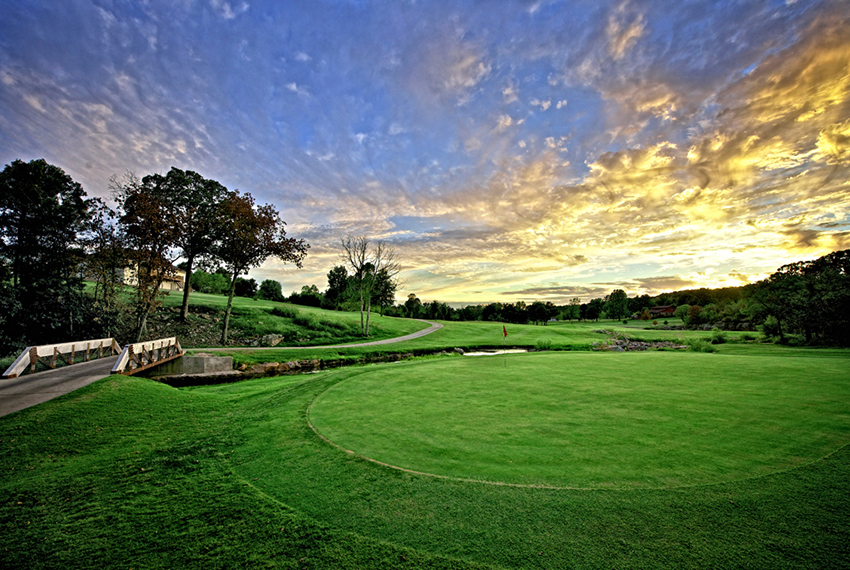 Two golfers playing the championship course near Joplin Missouri